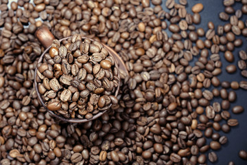 Coffee beans and coffee cup close-up. View from above.