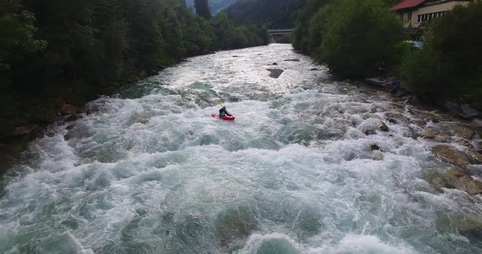 Aerial Drone Shot Kayaking Down Whitewater Rapids in Rosanna River The Alps