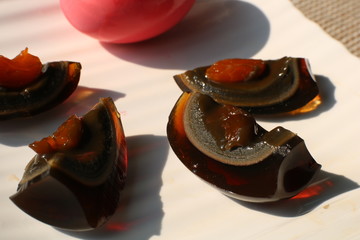 Century egg, traditional chineese and thai food. Whole egg with pink eggshell and black peeled egg...
