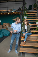 Man and woman planning their work in the new workplace