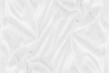 Fototapeta premium white cloth texture background, wavy fabric. top view.