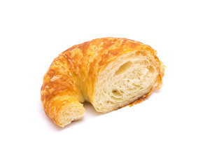 Studio shot one half cut of fresh baked French butter croissant isolated on white