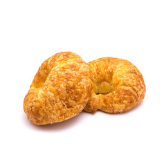 Studio shot two fresh baked French butter croissant isolated on white