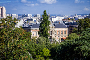 Fototapeta na wymiar 19th borough Town Hall view from the Buttes-Chaumont, Paris