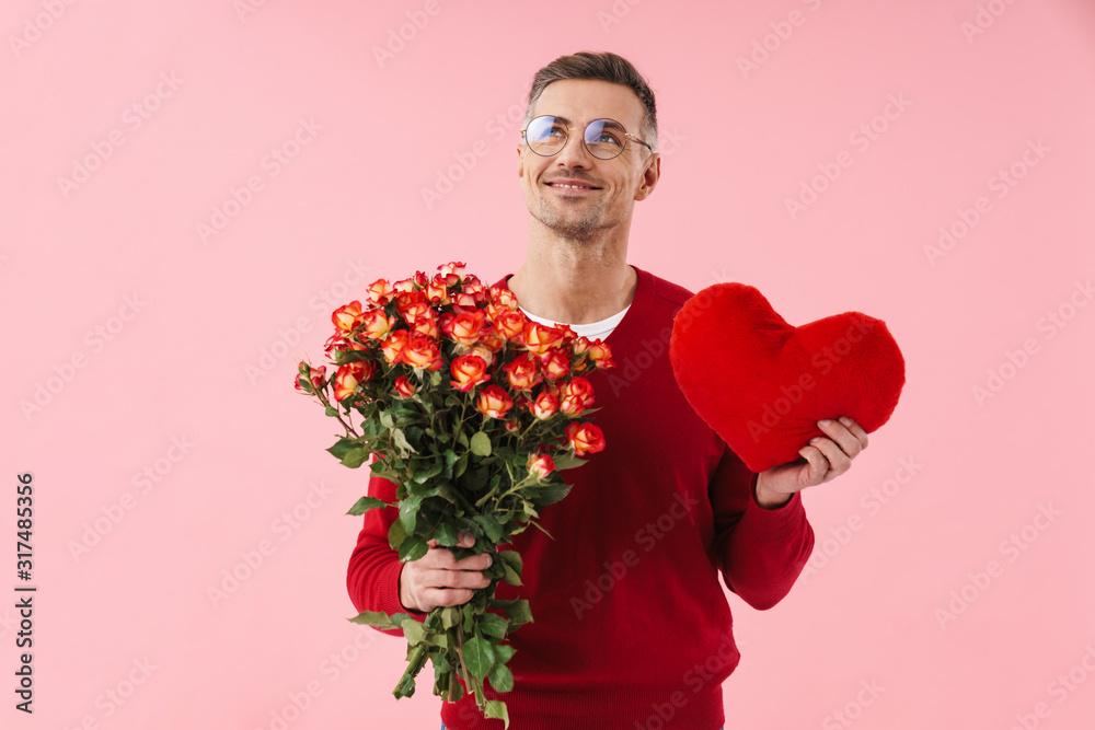 Sticker portrait of handsome caucasian man holding flowers and toy heart