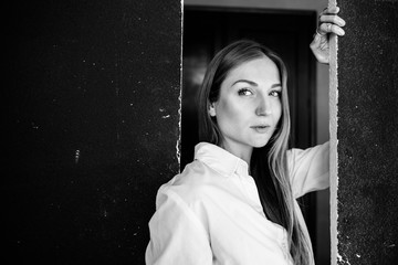Black-white photo of a girl in the studio