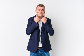 Young business caucasian man doubting between two options.