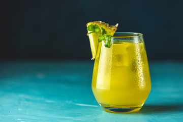 Spicy pineapple jalapeno mezcalita or margarita for Cinco de Mayo is a refreshing cocktail made with pineapple, cilantro, jalapeno and  mexican distilled alcoholic beverage
