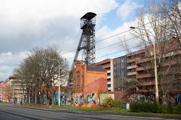 Jindrich mine, Ostrava, Czech Republic / Czechia -  former headframe of the mine. Street in industrial city.