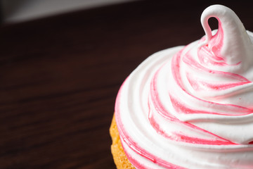 Vanilla cupcake, with a protein cream in the form, stained with red currant juice.