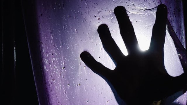 Hand feels slippery film - a scene of nightmarish sleep and horrors