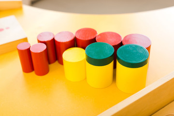 Selective focus of colorful wooden board game on table in class