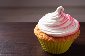 Vanilla cupcake, with a protein cream in the form, stained with red currant juice.