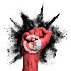 Tunisia raised fist with powder explosion, power, protest concept