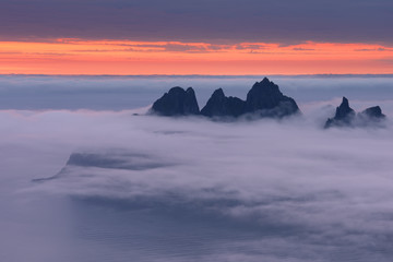 Rocks of Senya island, shrouded in clouds. Norway