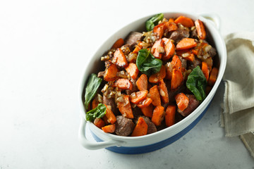 Roasted beef with carrot and green basil