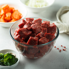 Raw beef with vegetables ready for cooking