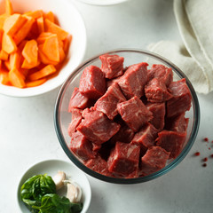 Raw beef with vegetables ready for cooking