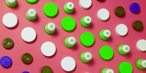 Many different types used or new battery, rechargeable accumulator, alkaline batteries on color background.