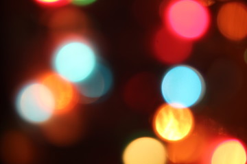 Fototapeta premium Christmas background, garland lights glare.