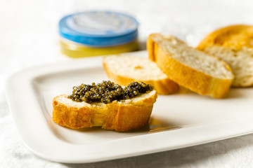 Black caviar on toast