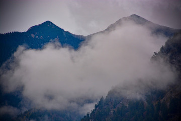 Fototapeta premium Alps Alpine Landscape near Reutte in Austria with mist