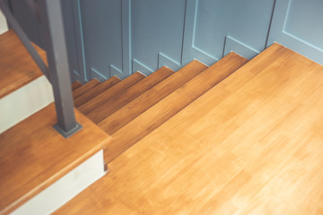 Top view of wooden staircase at home. Interior design of floor