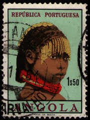 ANGOLA - CIRCA 1961: post stamp 1.5 Angolan escudo printed by Republic of Angola, shows a portrait...