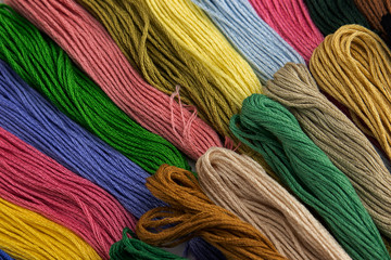 A large set of threads for embroidery.