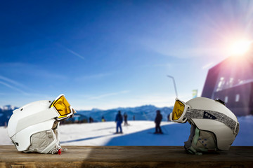 Desk of free space and winter ski equipment.Blue sky and sunny day. 