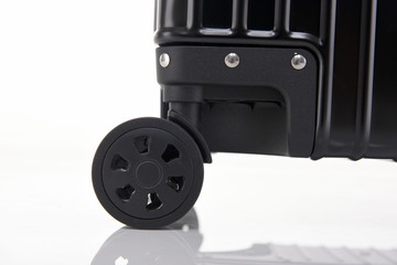 Exquisite black suitcase on white background