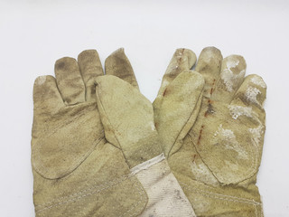 Industrial Used Dirty Rusty Vintage Rubber Gloves for Builder Hard Working Outdoor Projects in White Isolated Background