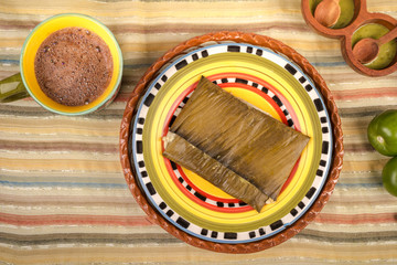 Oaxacan tamal made of corn chicken pork and chili