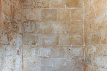 A dirty smudged old White bricks.