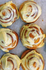 Pumpkin cinnamon rolls with sugar icing
