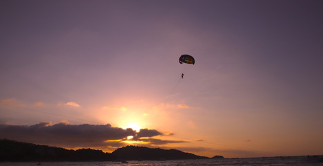 Parasailing at Patong Phuket Thailand at Sunset beautiful colours