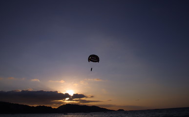 Parasailing at Patong Phuket Thailand at Sunset beautiful colours