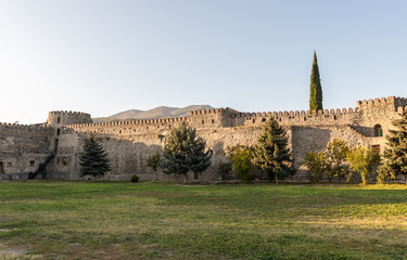The courtyard and the outer wall of the Svetitskhoveli Cathedral in the Mtskheta city in Georgia