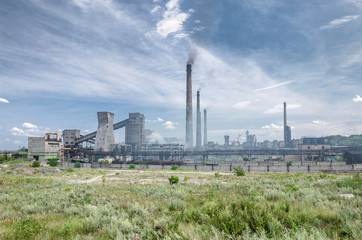 Fototapeta na wymiar The largest air pollutant in city Dnipro Ukraine is coke-chemical plant. Flue gas stacks emit hundreds tons of harmful substances a years into the atmosphere. Industrial landscape.
