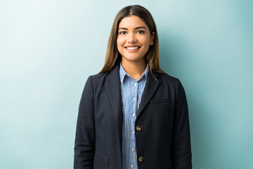 Beautiful Hispanic Businesswoman In Black Suit