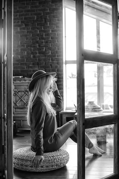 cute blonde black and white / portrait of a beautiful adult blonde girl in vintage style black and white photo