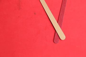 Nail file on colorful background