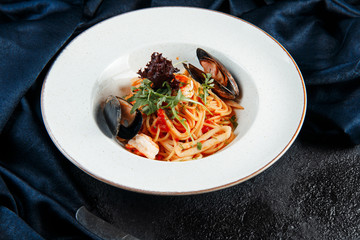 seafood pasta, shrimp, mussels, squid, red sauce