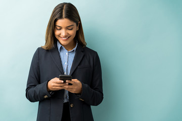 Young Female Professional Surfing On Smart Phone