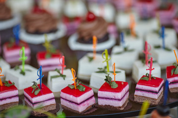 many different desserts on the wedding table