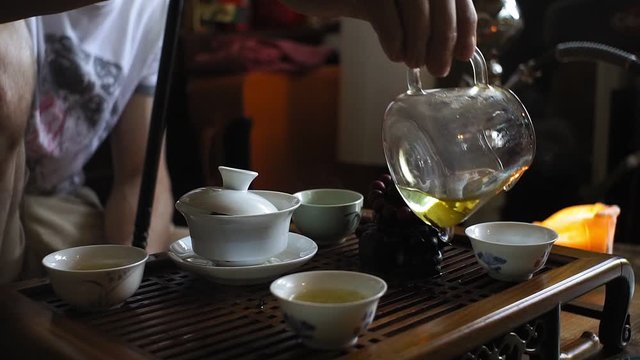 tea ceremony, pours hot tea, green tea