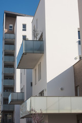 Fototapeta na wymiar Modern concrete balcony s in a cut out on blue sky