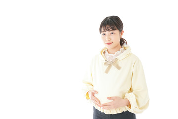 私服姿の若い妊婦の女性