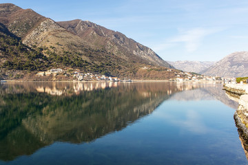 Fototapeta premium Montenegro, Kotor Bay, reflection of the city in the sea