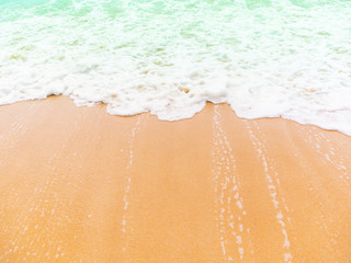 Beach top view.beach sand and blue sea in thailand. summer holiday travel concept.